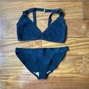 Herve Leger black bikini.
